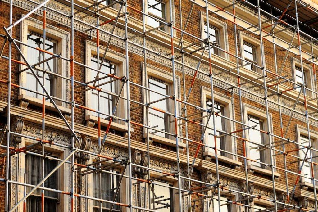 Row Of Terraced Town Houses With Scaffolding On